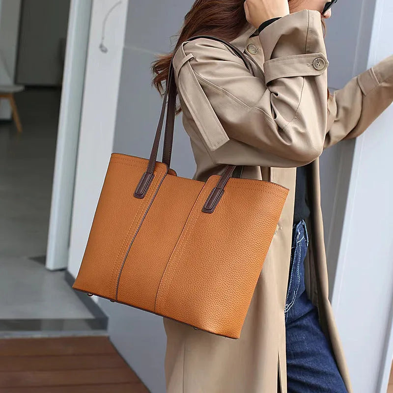 Women's genuine leather crossbody bag in horizontal square design with multiple internal compartments