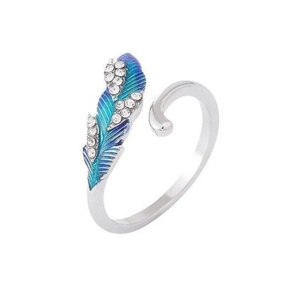 Bright blue feather earring and ring set in alloy with geometric design
