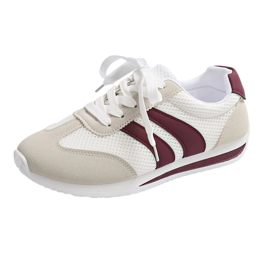 Wine red Cortez-style casual sneakers with a cross-strap detail and mesh lining.