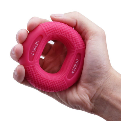 Adjustable silicone grip ring in various colours for finger and forearm training