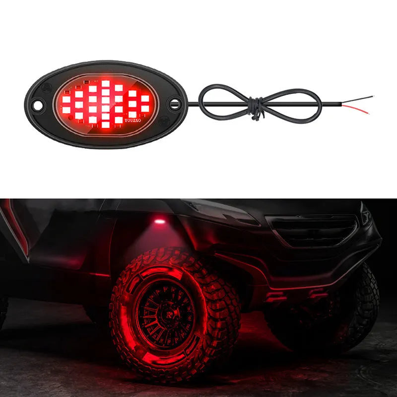 12V car LED chassis ambience light in ABS housing with five colour options on a dark vehicle underside