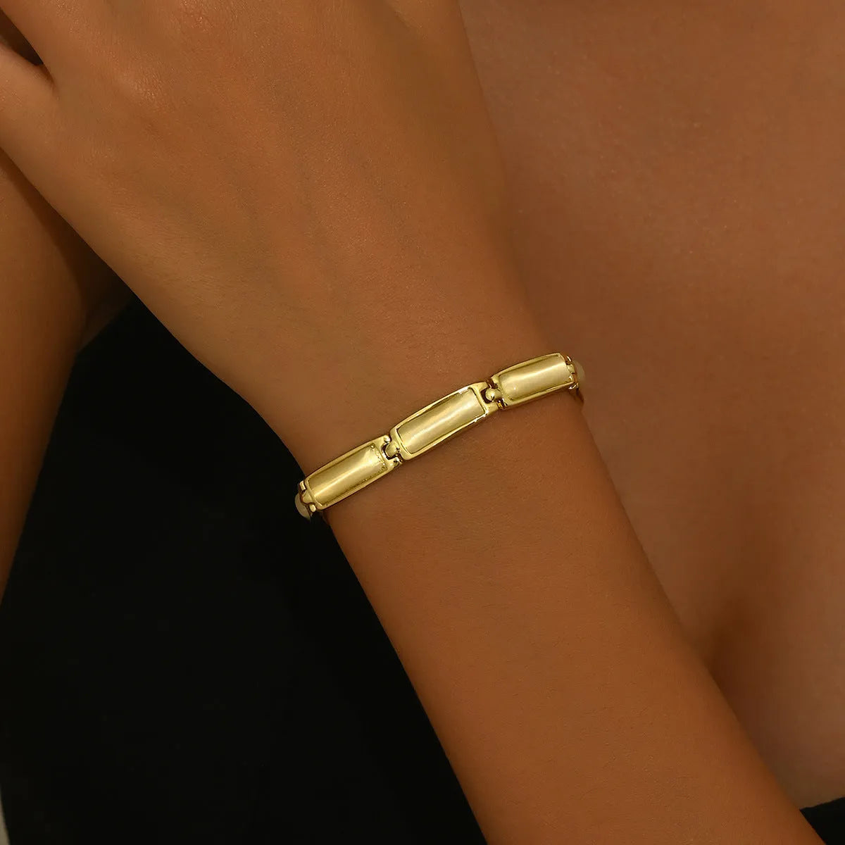 Geometric rose gold opal bracelet for women with quadrilateral alloy frame and gemstone inlay