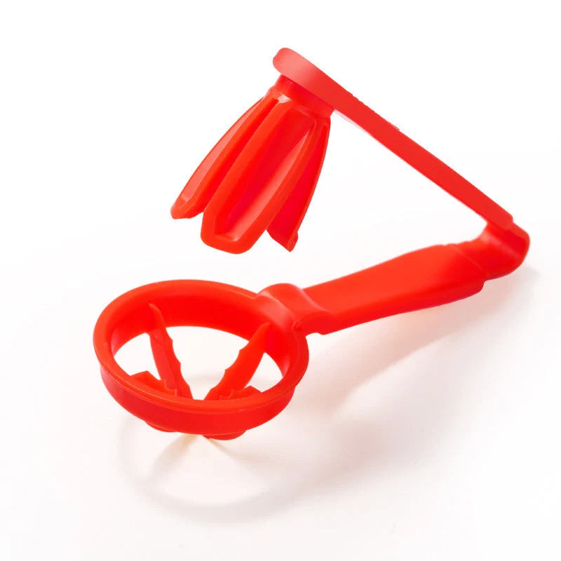 Manual tomato slicer with serrated knife for even dicing, available in red and yellow