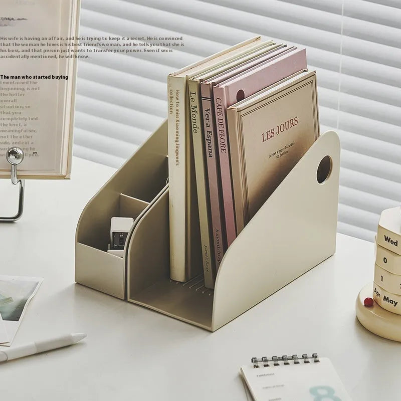 Plastic desktop storage box with two grids in milk coffee colour on a wooden desk.