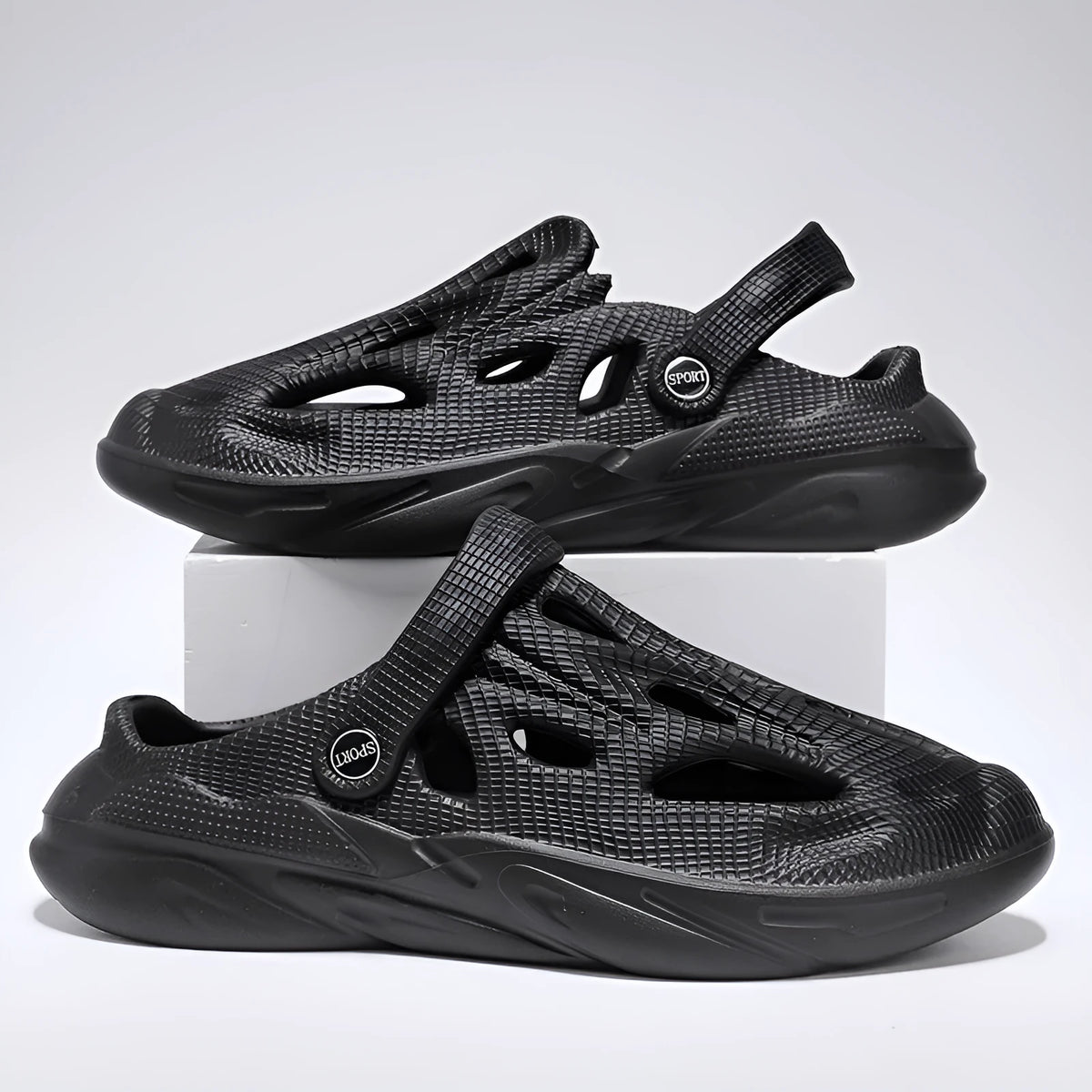 Men's hollow cut-out EVA slip-on shoes in sand colour, side view, with round toe and flat sole