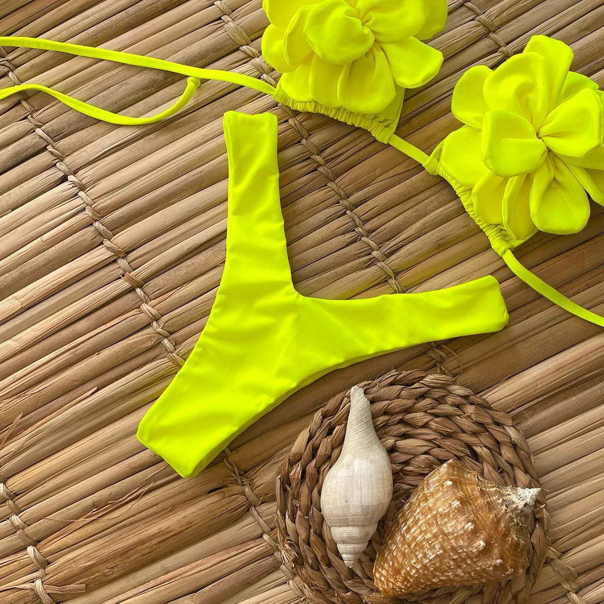 Low waist bikini swimsuit with 3D flower design in solid colour