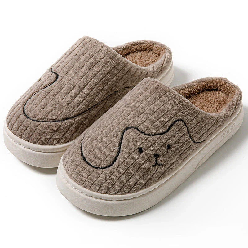 Cozy cat-themed slippers with plush uppers and non-slip rubber soles, available in a variety of vibrant colors