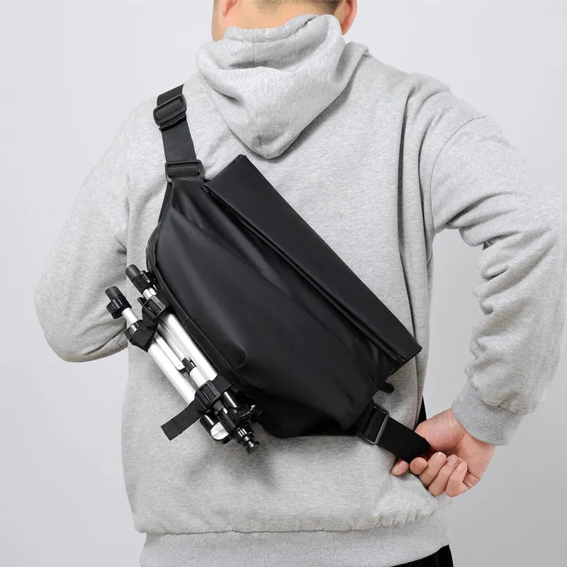 Grey and black men's medium PU crossbody bag with a zipper and internal organisers.
