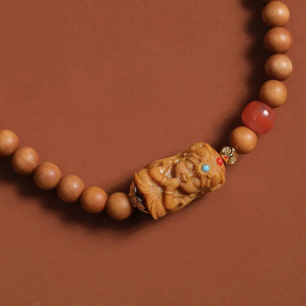 Brown wooden bracelet with 6mm round beads featuring double circle pattern