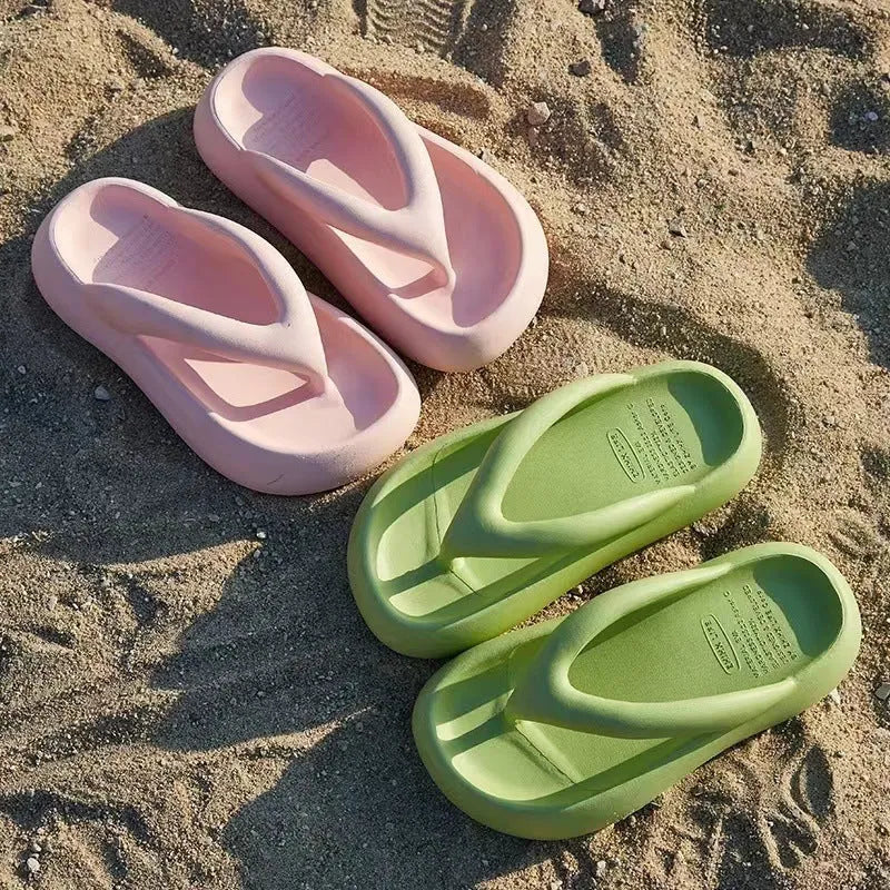 Solid colour thick-soled EVA flip-flops with a bow detail, shown in multiple colour options.