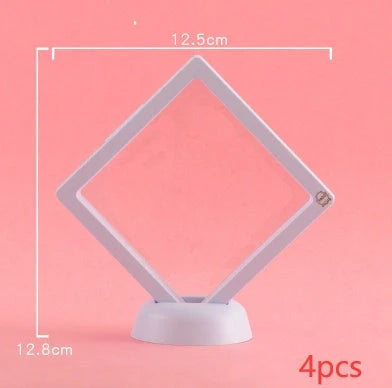 3D floating jewelry display stand showcasing earrings and coins in mid-air