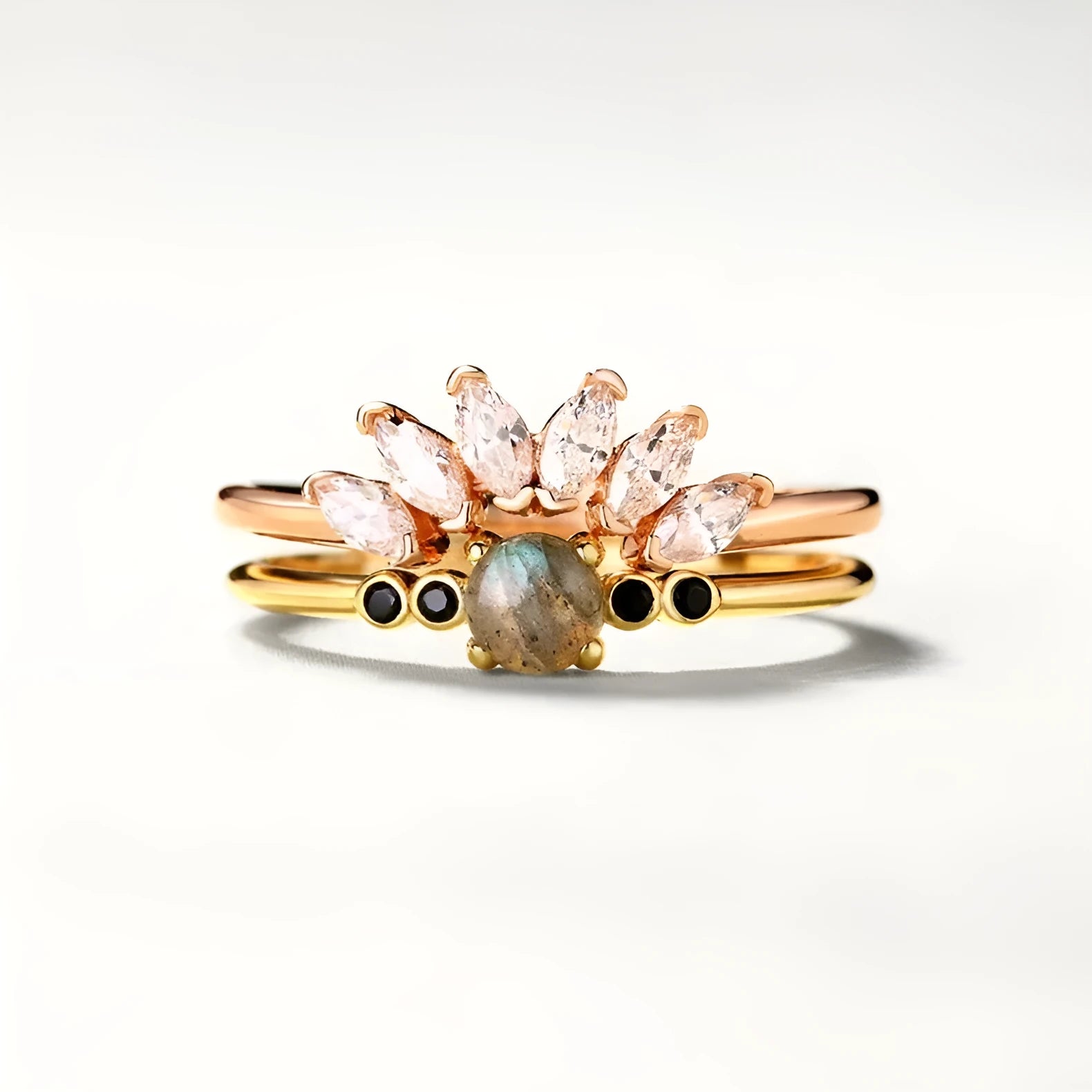 Gold coloured open ring with geometric round shape on silver base with electroplating