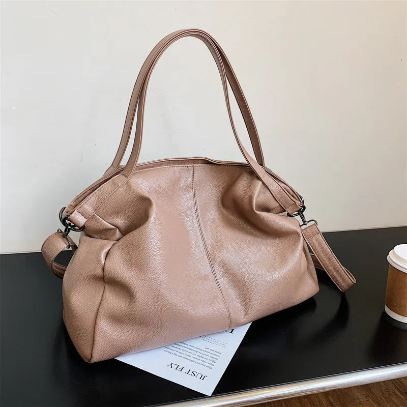 Large soft-surface PU messenger tote bag in a choice of colours, showing internal pockets and adjustable shoulder strap.