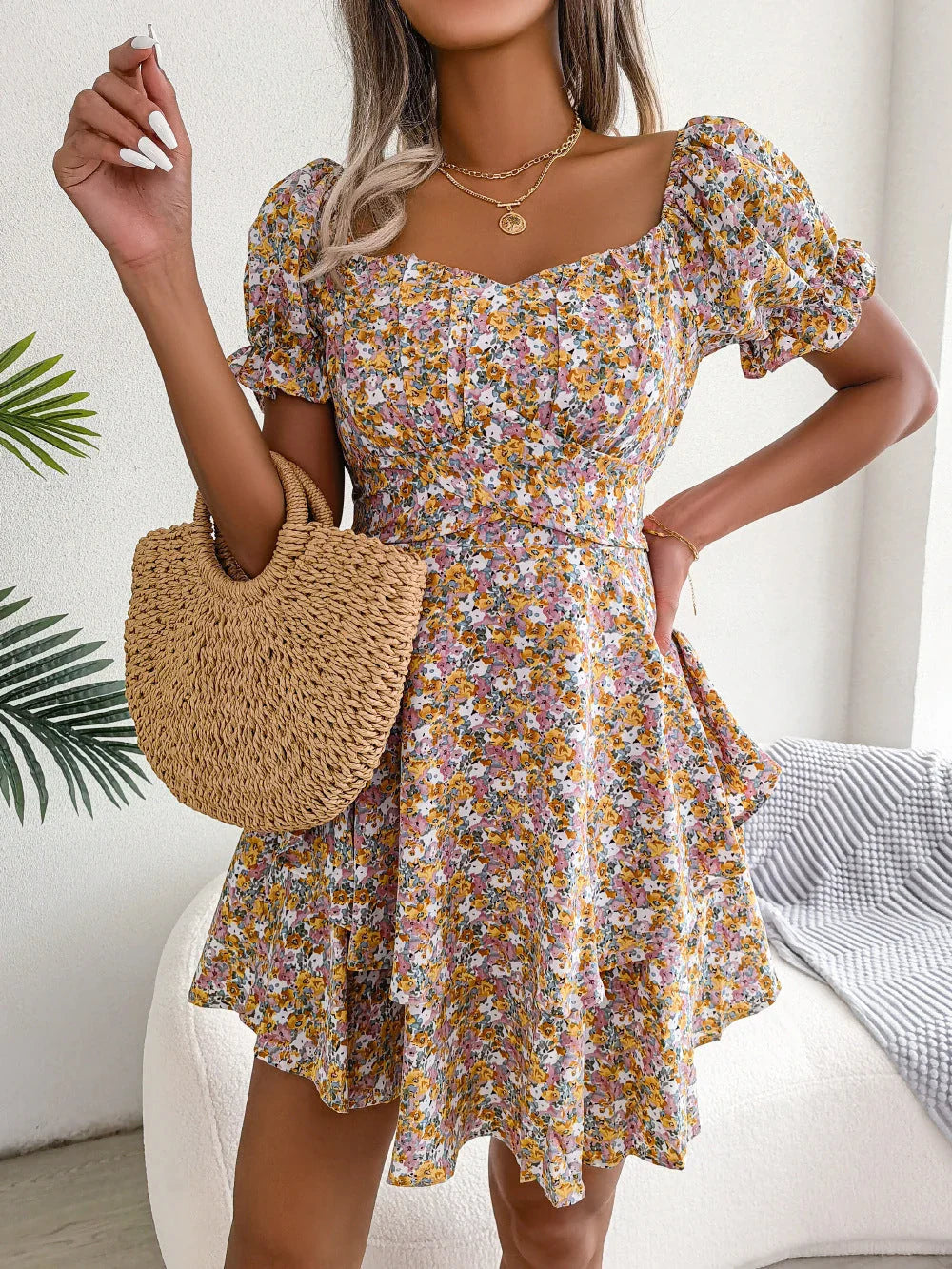 Stylish floral mini dress with ruffled hem, high waist, and short sleeves in various colors