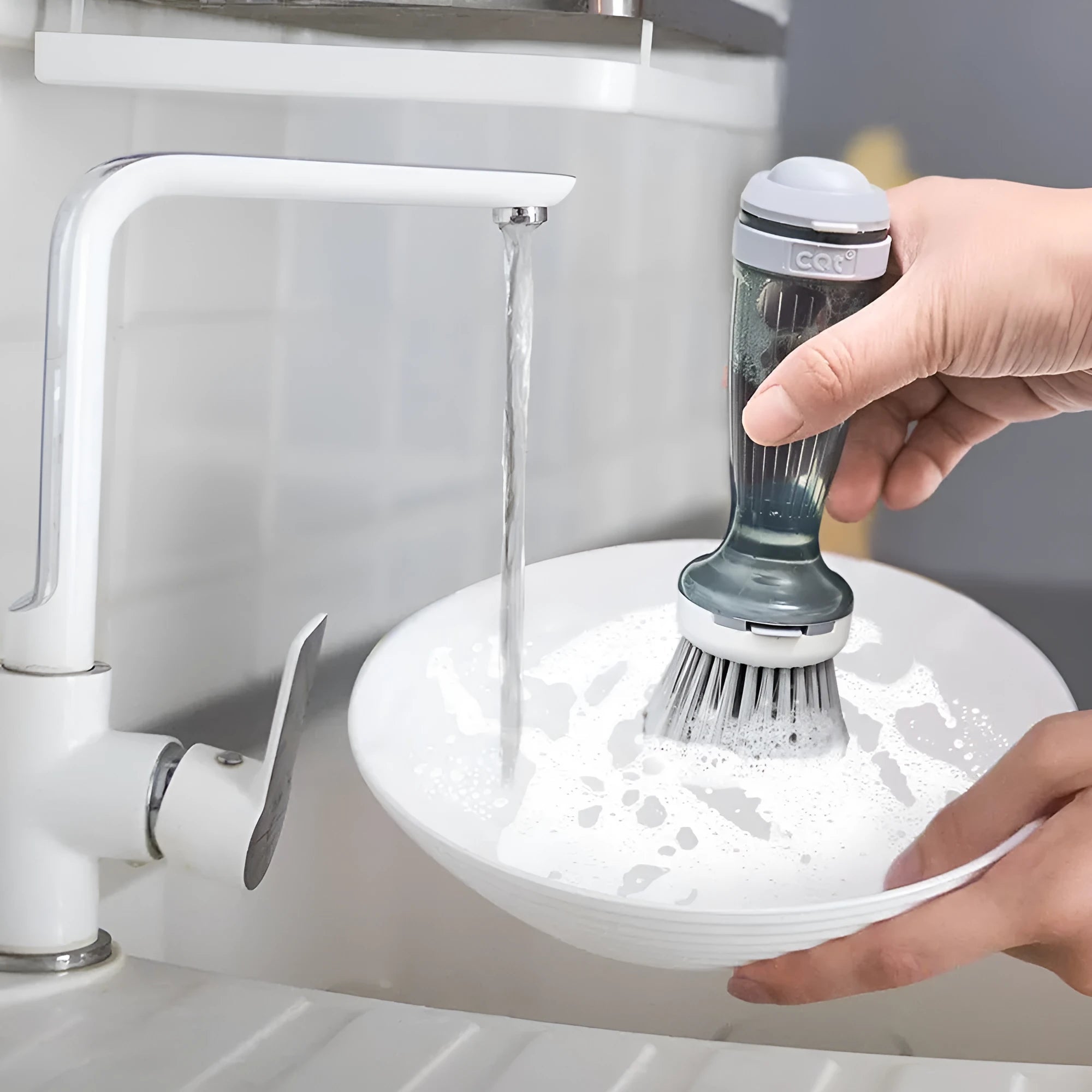 Pot brush with soap dispenser in mint green colour showing replaceable brush head and non-scratch bristles