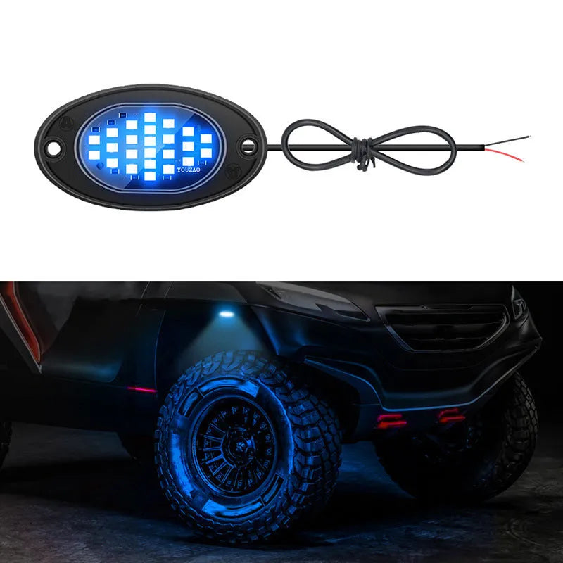 12V car LED chassis ambience light in ABS housing with five colour options on a dark vehicle underside