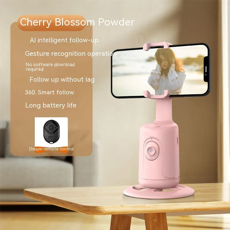New automatic tracking stabiliser in dark black ABS plastic with 360-degree rotation on a desktop, USB cable attached