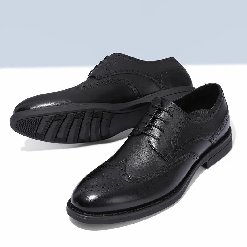 Men's black and brown brogue leather shoes with traditional perforated detailing