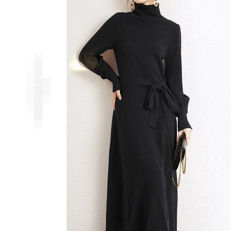 Women's turtleneck knit dress in rose red with long sleeves, loose hem, and elastic waist.