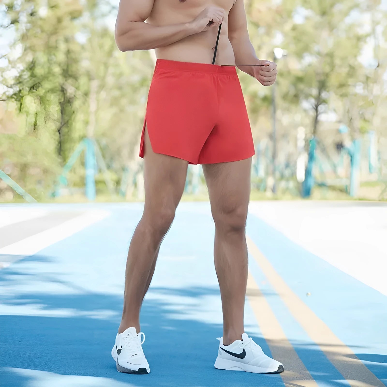 Men's black loose-fit off-road running shorts with a high waist, made from quick-dry fabric.