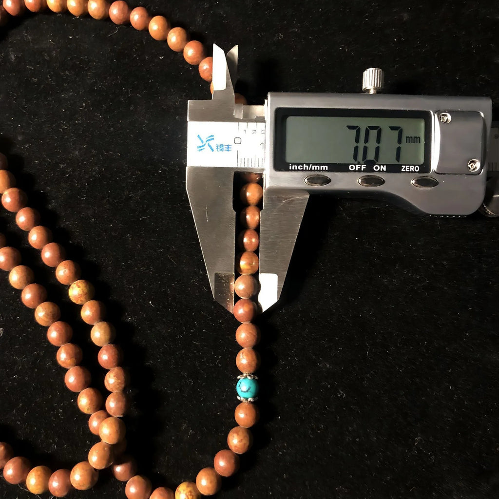 108 bead Lvzhu stone bracelet with hand-polished 5-6mm beads in geometric design