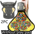 Green felt cube storage bag with pull rope, laid flat as a play mat and gathered into a bag.