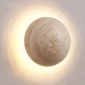 Yellow semicircular cave stone wall lamp with wood art base measuring 15cm in diameter