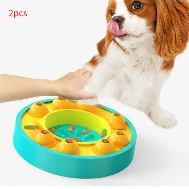 Square green dog puzzle feeder bowl with rotating turntable top and non-slip rubber base.