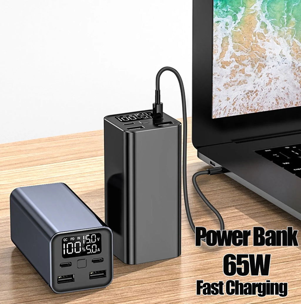Black high‑power 65W 20000mAh metal laptop charging bank showing its size and ports.