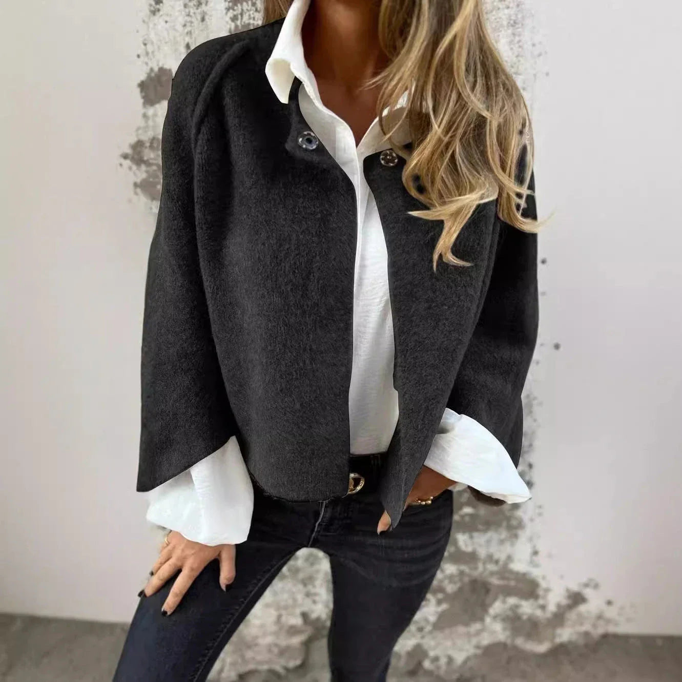 A cozy batwing sleeve cardigan made with a soft, luxurious imitation cashmere blend fabric in a variety of stylish colors.