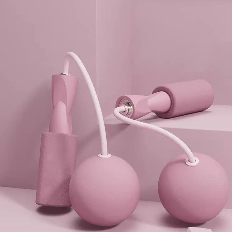 Weighted cordless jump rope with blue handles and PVC-coated steel rope for indoor fitness training