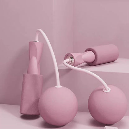 Weighted cordless jump rope with blue handles and PVC-coated steel rope for indoor fitness training