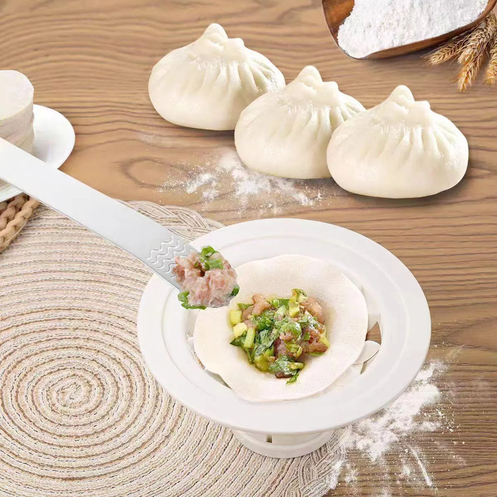 Set of four identical black plastic baozi moulds for shaping steamed buns and dumplings