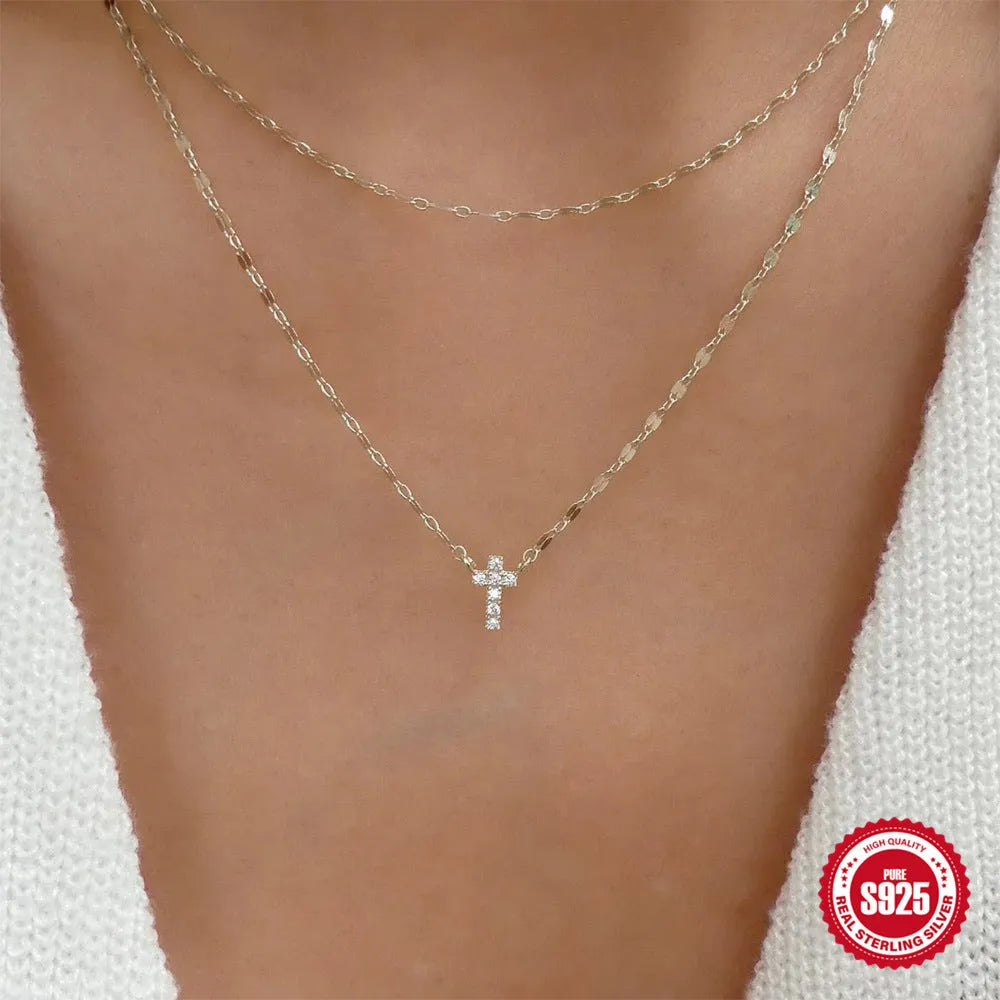 S925 sterling silver double layer twin diamond cross pendant on a clavicle chain.