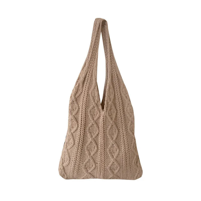 Retro hollow knitted woolen shoulder tote bag in a solid colour with double straps, shown flat displaying its large size.