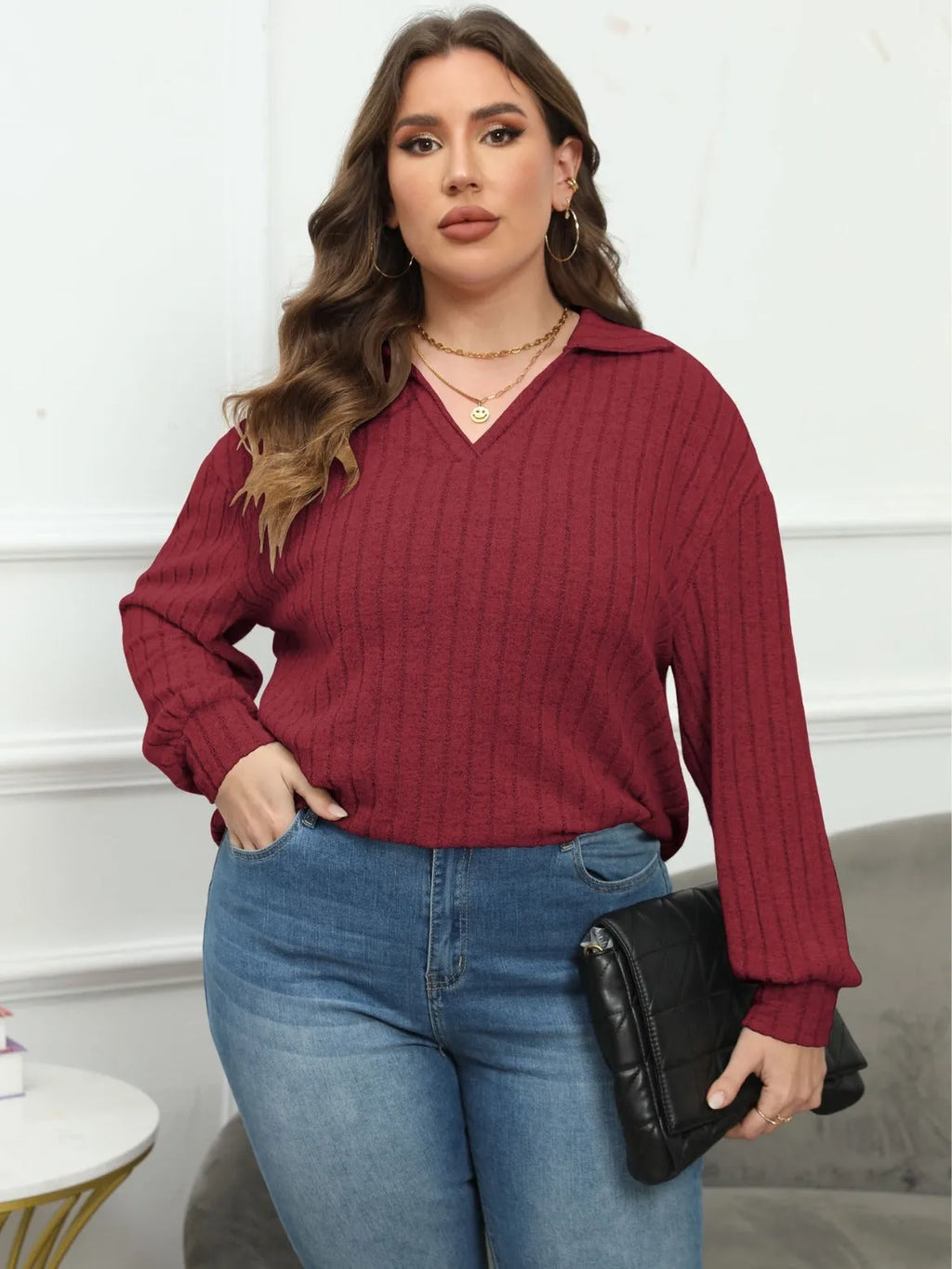 Women's plus size grey polo collar fleece pullover shirt with full lantern sleeves.