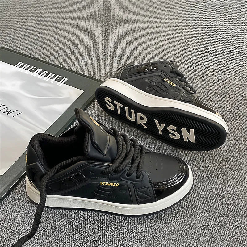 Men's black thick bottom board shoes with PU leather upper and rubber sole on a light background