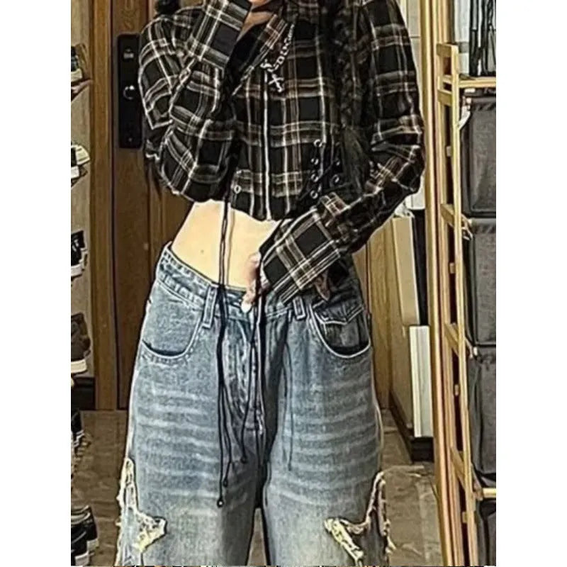 Blue high-waist wide-leg denim jeans with straight cut on hanger