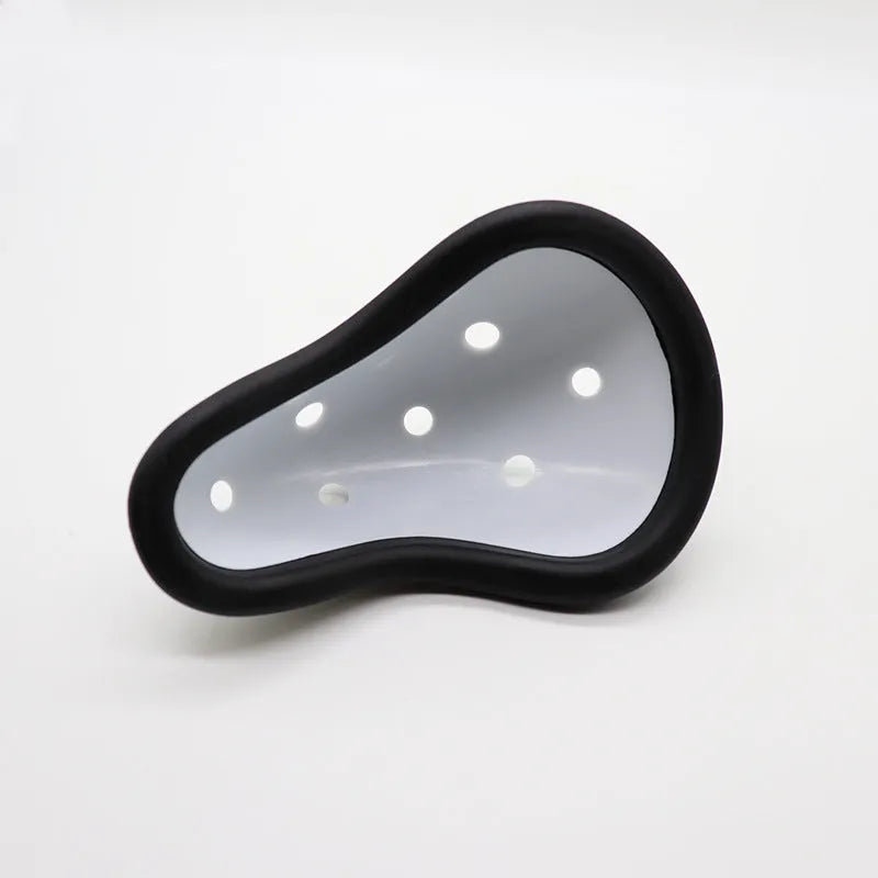 Black rubber sports genital protector for adult and child sizes used in hockey, rugby, and martial arts.