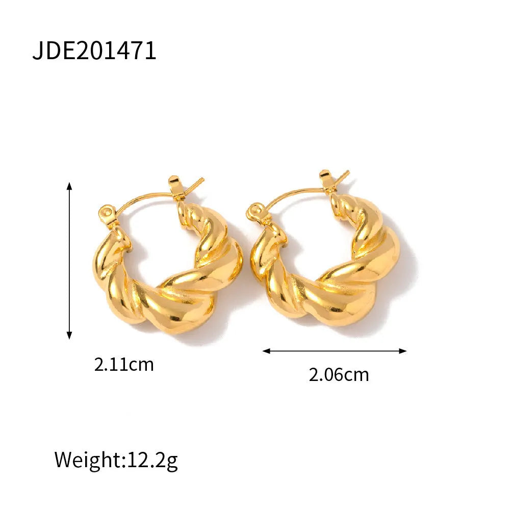 18K gold titanium steel geometric ellipse ear clip for women, light luxury style, on a model