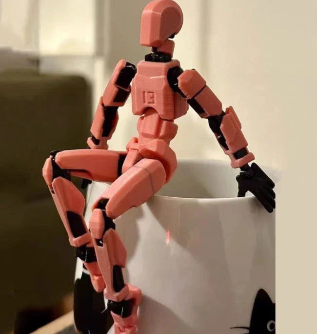 Customizable 3D printed robot mannequin with posable joints for creative expression, illustration, desk decor, and unique gifting.