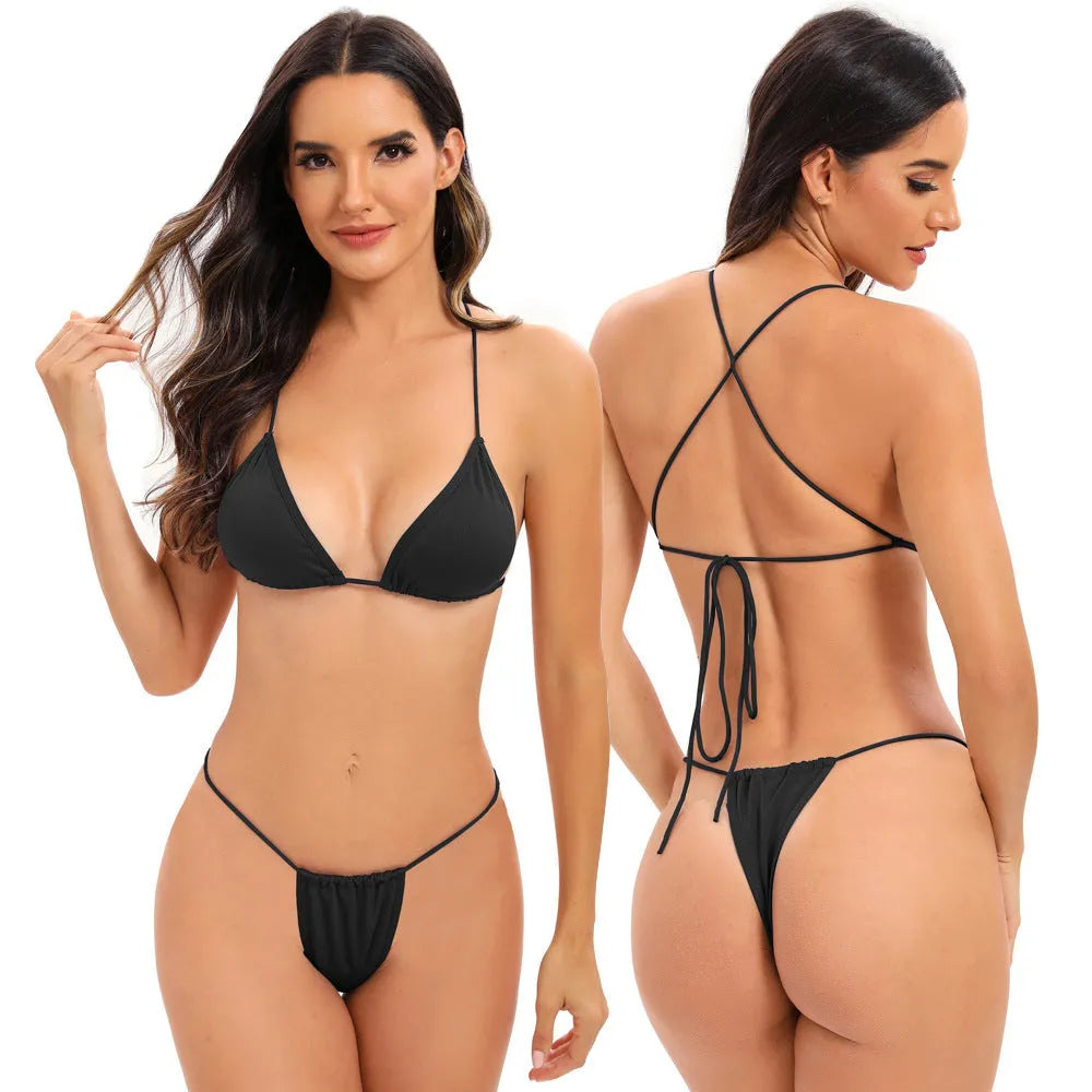Women's candy coloured cross strap bikini swimsuit with multiple adjustable straps on a mannequin.