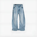 Blue vintage washed denim straight-leg trousers with drawstring belt and zipper fly closure