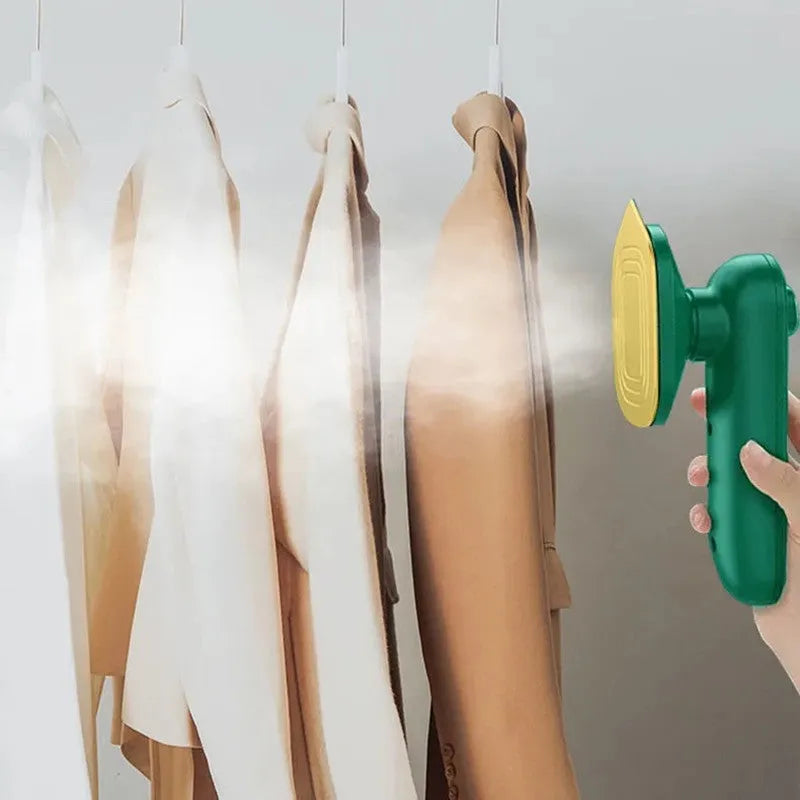 Dark green portable hanging steam iron with ceramic panel and compact design for travel use
