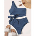 Solid colour one-shoulder women's swimsuit top in polyester and spandex, shown in black