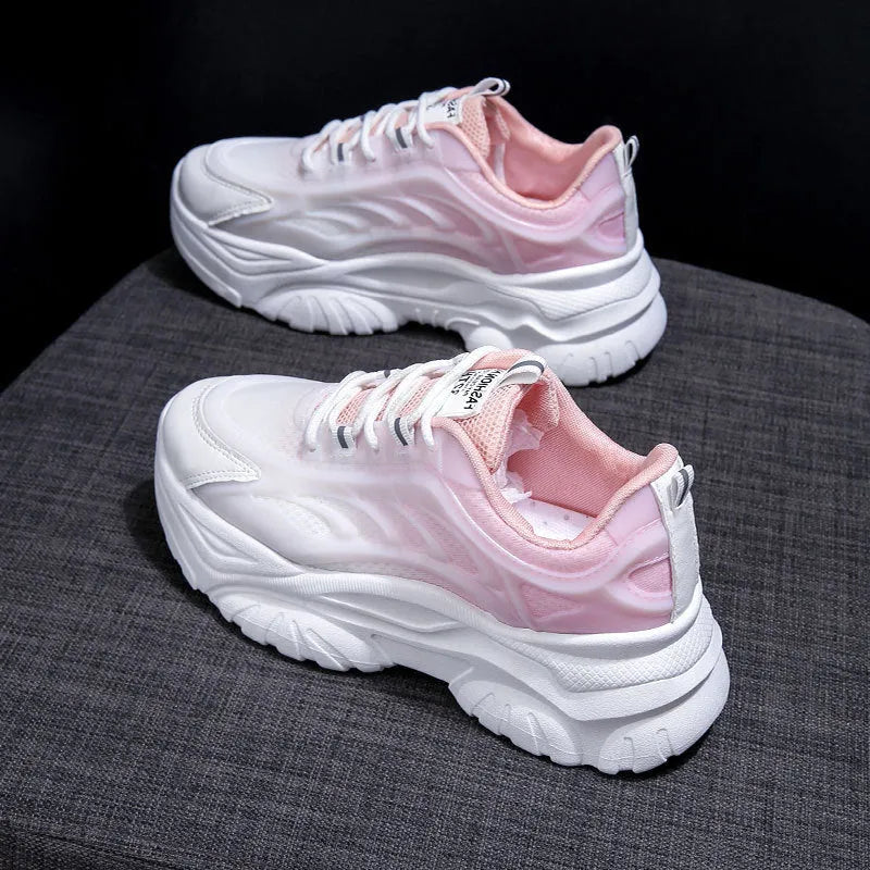 Women's blue satin lace-up casual sports shoes with round toe on a white background.
