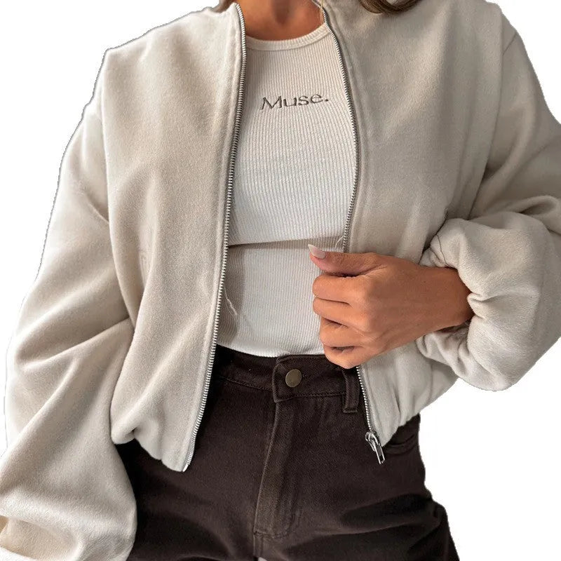 Women's milky white off-shoulder jacket with long lantern sleeves and pockets.