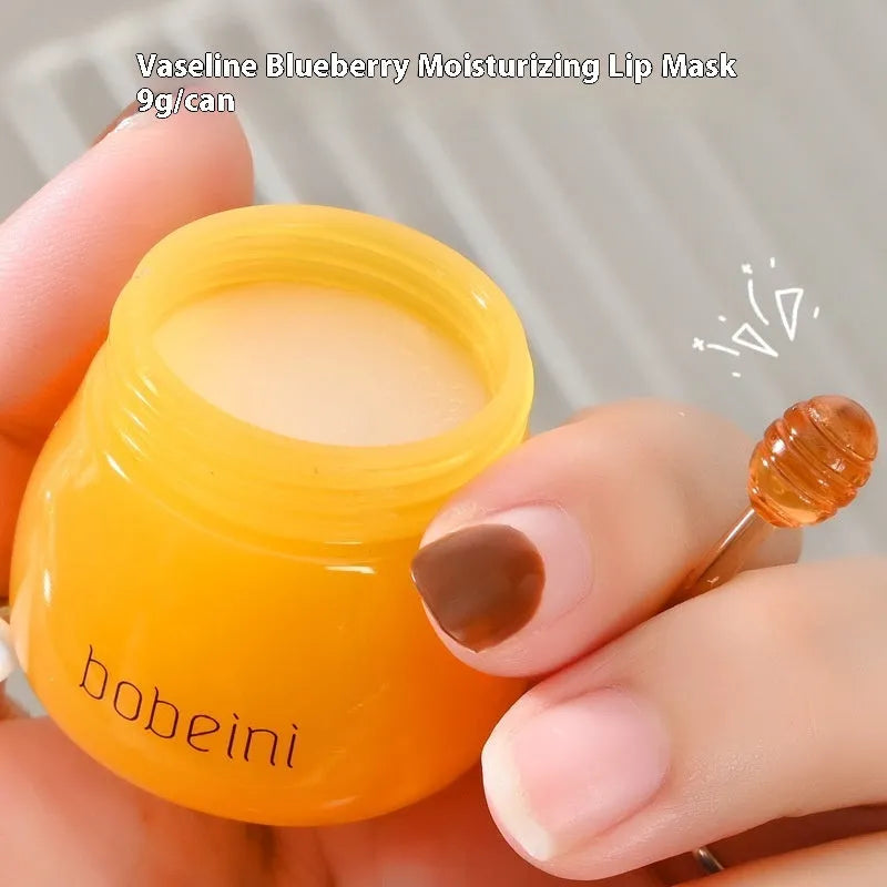 Honey pot lip balm with small brush applicator in pomegranate or blueberry flavour options