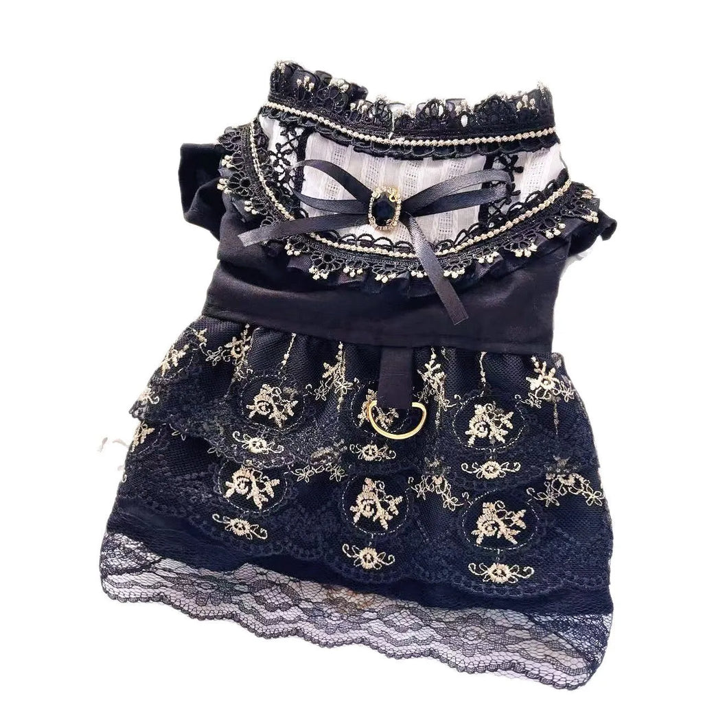 Golden gothic princess skirt costume for a small dog on a white background.