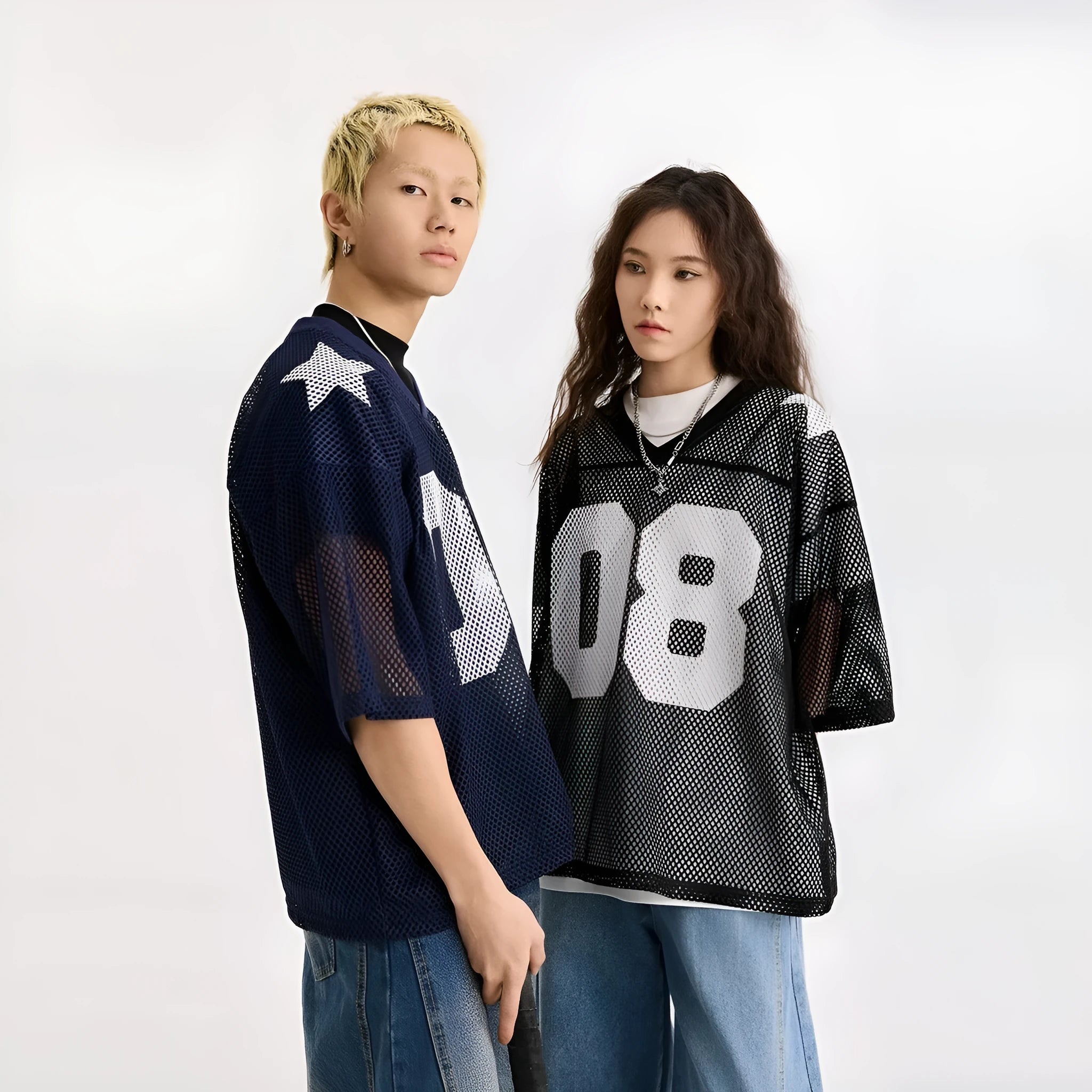 Black loose fit half sleeve pullover shirt with white letter print pattern.